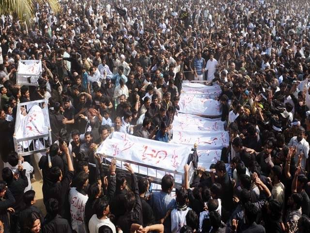 Victims of Karachi bomb attacks laid to rest