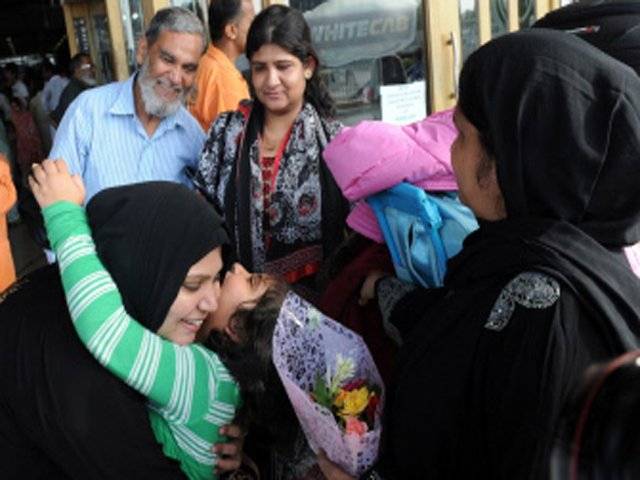 Relatives greet Pakistani jet diverted because of false bomb threat