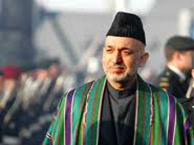 Karzai heads to Qatar to discuss peace with Taliban