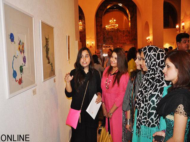  Visitors viewing the painting during exhibition in Islamabad
