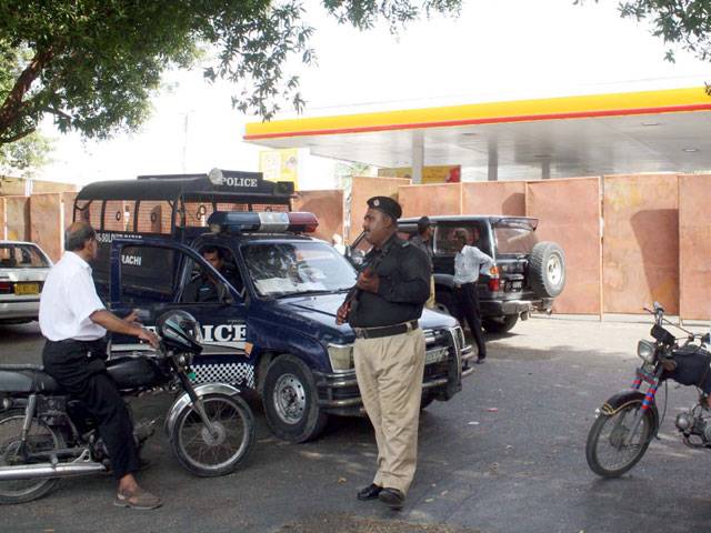 Citizens standing perturbed at petrol pumps to get fuel In Karachi secondly Demonstrators burn tyres on M A Jinnah Road 