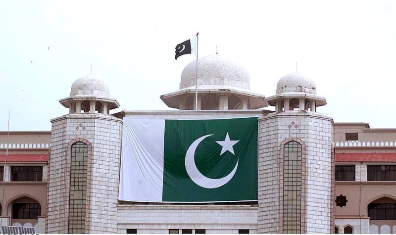 National Flag hoisted at PM House torn due to rain
