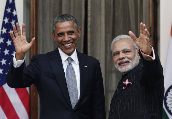 Obama arrives in India to build 