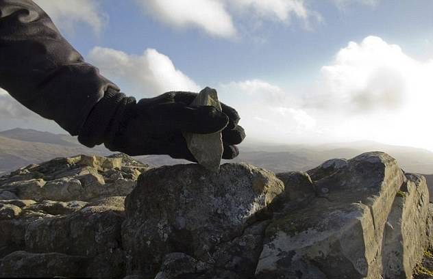 Artist accused of vandalizing England's highest mountain