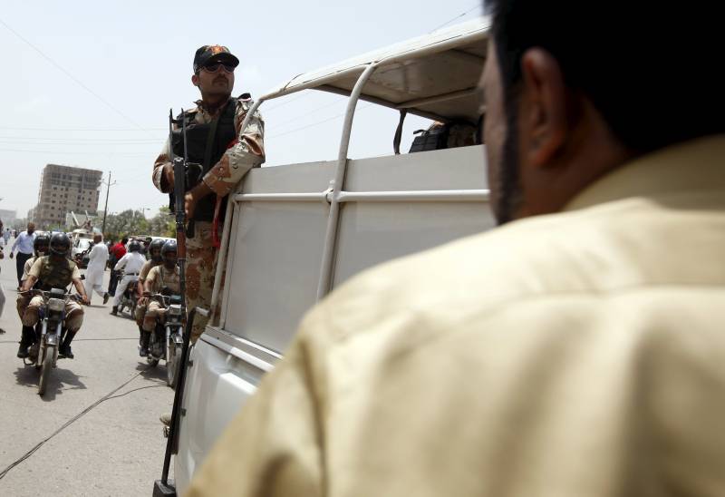 Motorcycle gunmen kill 43 bus passengers in Karachi