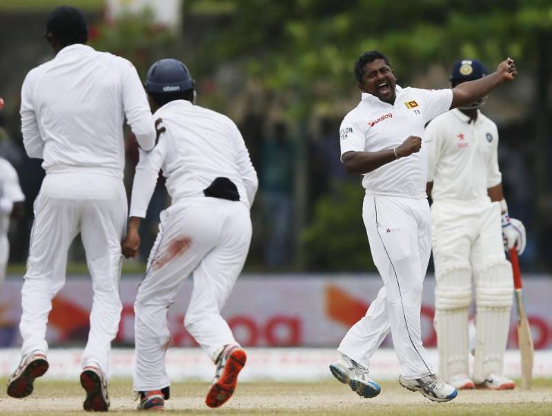 Herath takes seven to spin Sri Lanka to comeback win against India