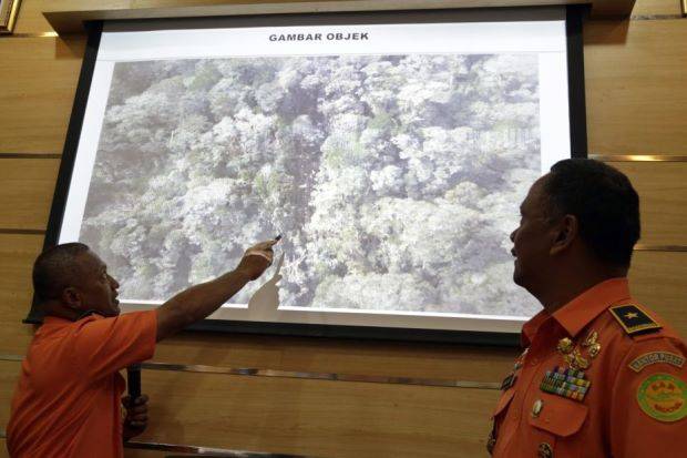 Treacherous terrain hampers rescue efforts for crashed Indonesian plane