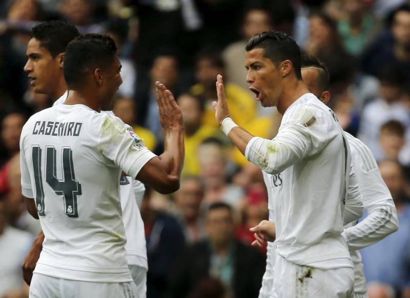 Real, Barca lead after comfortable wins