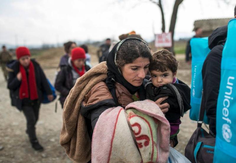 Balkan nations cap migrant numbers as EU warns of 'disaster'