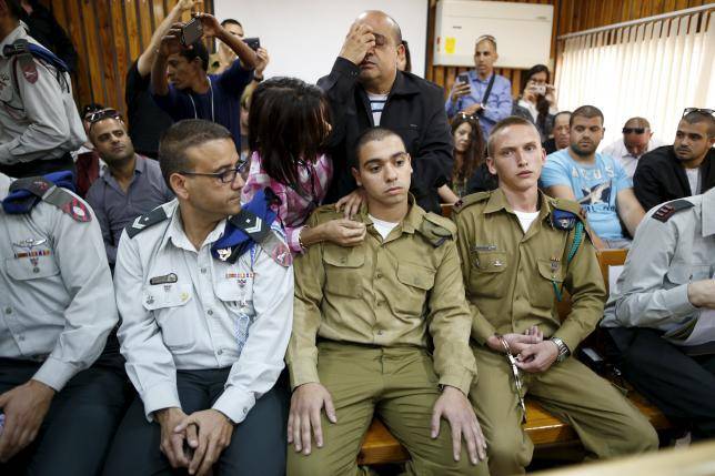 Trial opens of Israeli soldier who killed wounded Palestinian