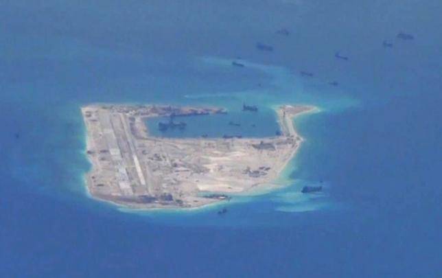 U.S. sails warship near Chinese-claimed reef in South China Sea