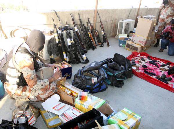 Rangers seize huge cache of heavy arms in Karachi raid