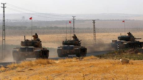 Turkey sends more tanks to Syria, demands Kurdish fighters retreat