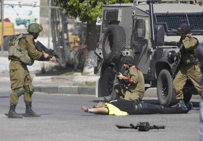 Israeli troops kill Palestinian who ran toward them, army says