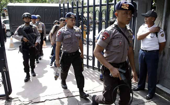 Two Indonesian police stabbed by suspected Islamist militant