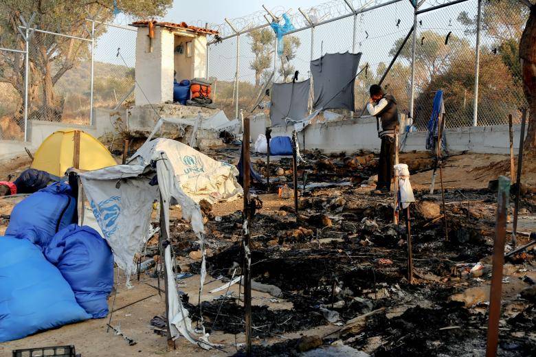 Fire at Greek migrant camp kills two