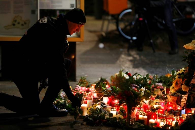 Germany hunts for attacker after IS claims truck rampage