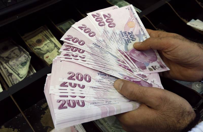Turkish lira slides as central bank help falls short