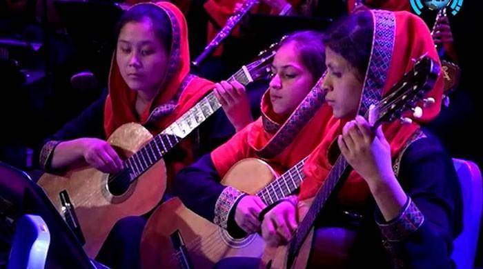 Afghan orchestra puts women's rights center stage at Davos