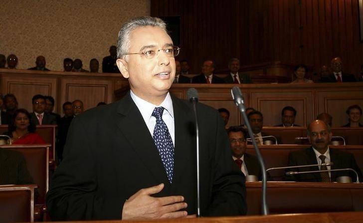 New Mauritius PM takes over from father, opponents cry foul
