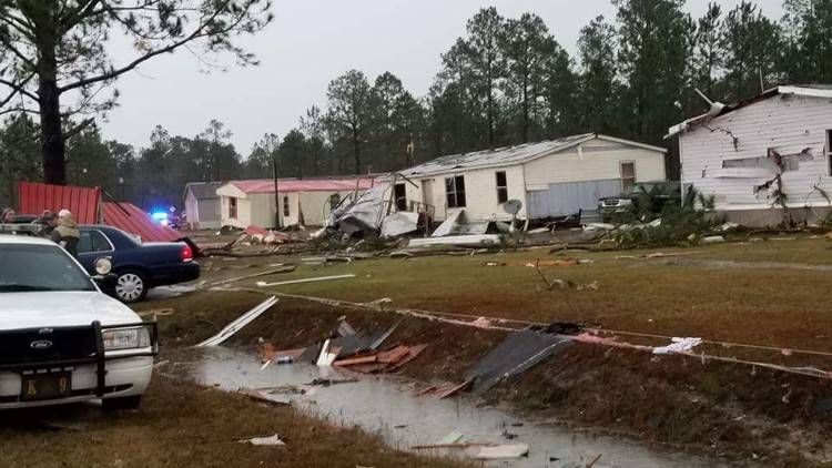 Storms continue slamming U.S. South after killing at least 18