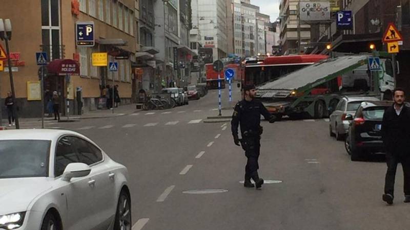 Truck crashes into Sweden store, three people dead