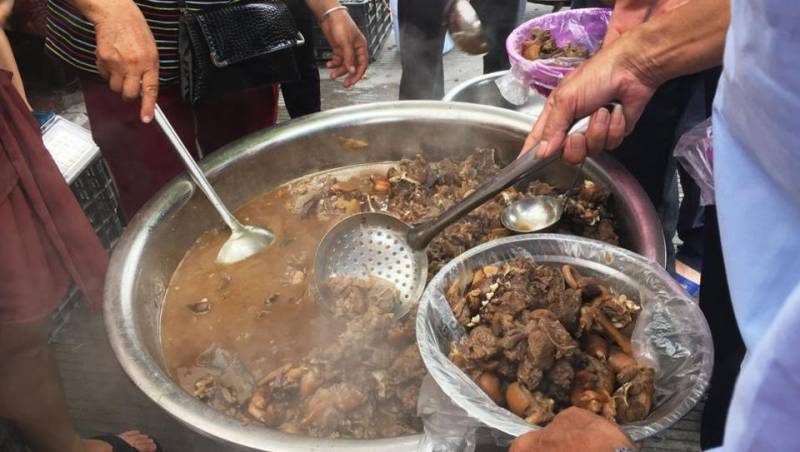 China's dog meat festival opens despite ban rumours