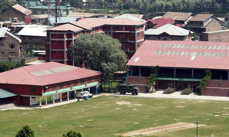 Indian soldiers clash with suspected rebels at Kashmir school