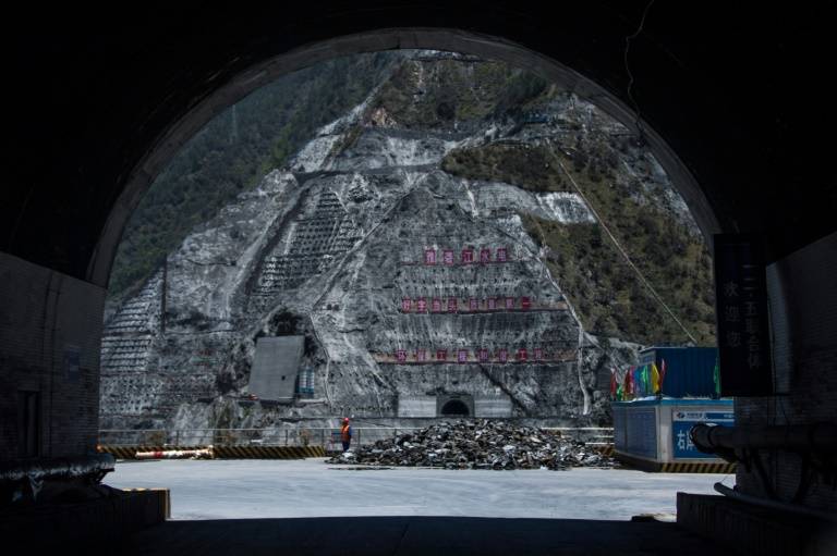 China's hydropower frenzy drowns sacred mountains