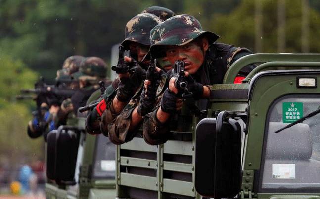 China's PLA moves troops, heavy equipment to Tibet: reports