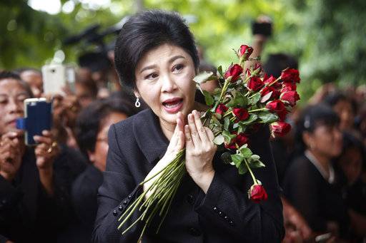 Thailand freezes former PM's bank accounts in rice subsidy case