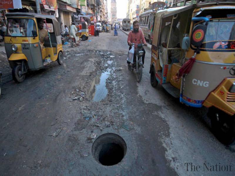 Minor dies after falling into open manhole in Lahore