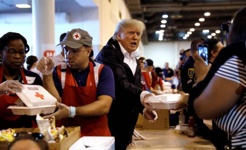 For storm-ravaged Houston, Trump's visit and baseball's return