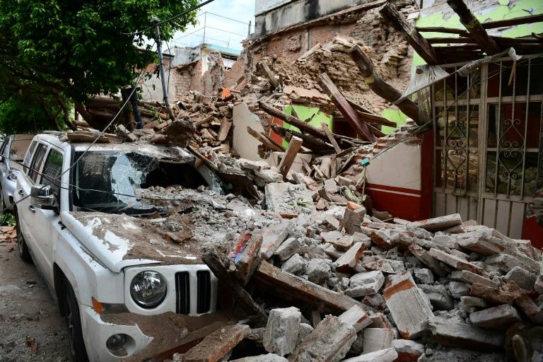 Rescuers dig for Mexico quake survivors as deadly storm strikes