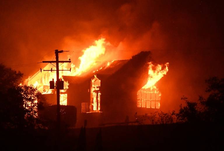 11 dead, thousands homeless as wildfires torch California wine country