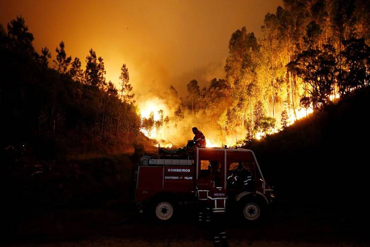 30 killed as wildfires rage in Portugal, Spain