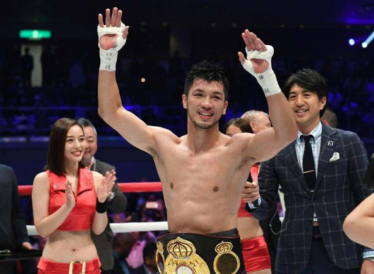 Boxing: Japan's Murata stops N'Dam to win world title