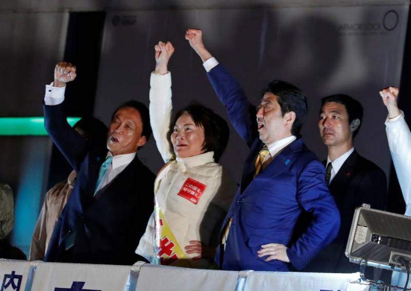 Japan PM Abe's ruling bloc on track for big win in election: TV exit polls