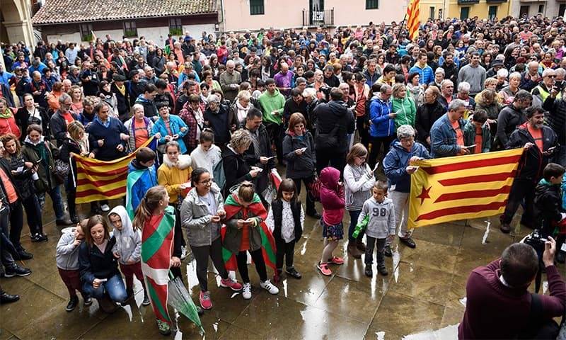 Catalan separatists threaten Spanish government with 'mass civil disobedience'