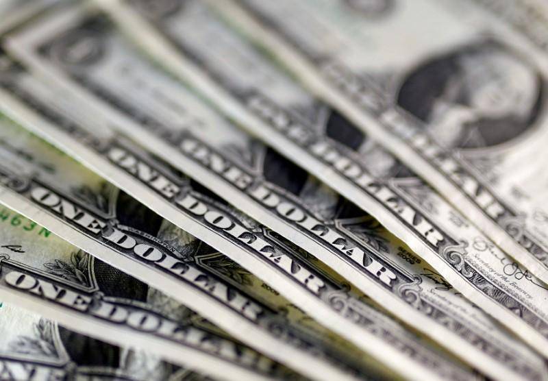 Dollar rises on optimism about fiscal, monetary policy