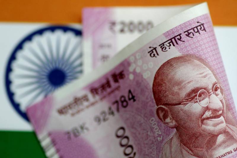 India touts bank note ban, opposition fumes and Nepal short-changed