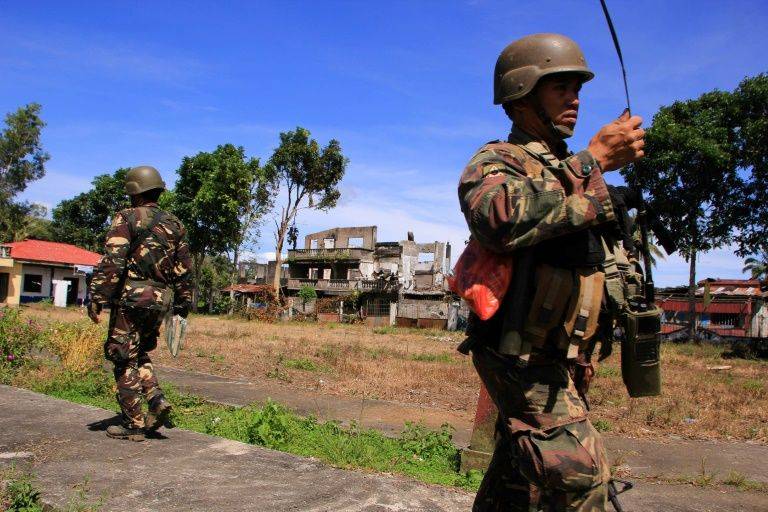 Clashes as Islamic State-linked gunmen seek new Philippine base: military