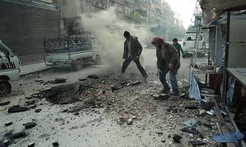 Syria army bombs splintered Ghouta enclave as bodies pile up