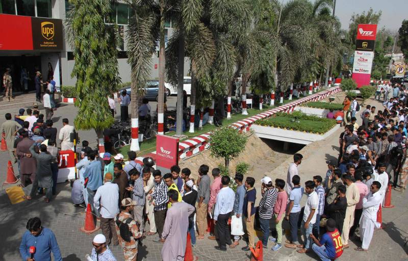 Guarded optimism: thousands patrol Karachi's cricket homecoming