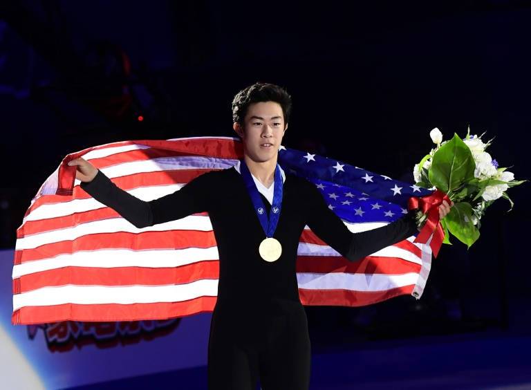 US teen Chen hits record six quads to win world gold