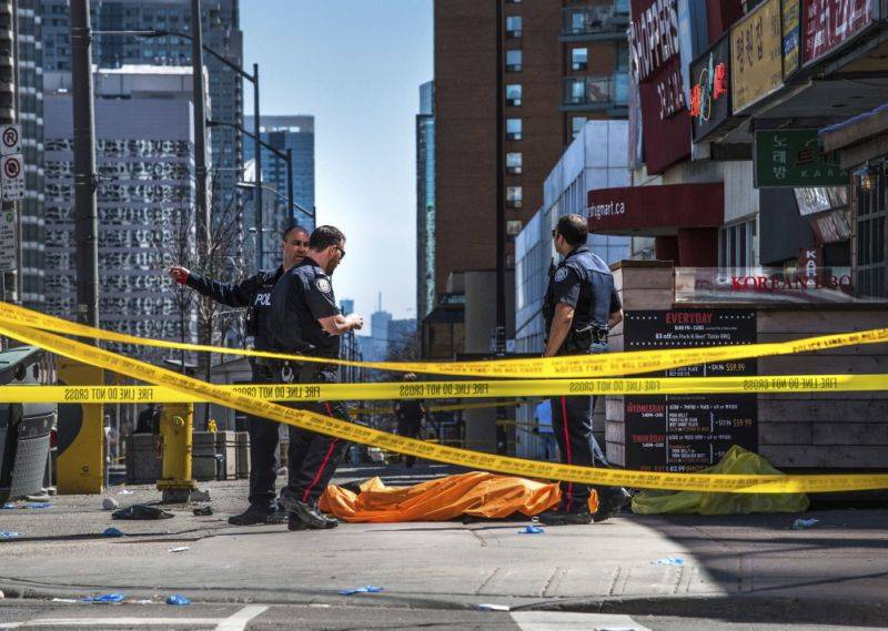 Van plows into Toronto crowd in 'deliberate' act, leaving 10 dead