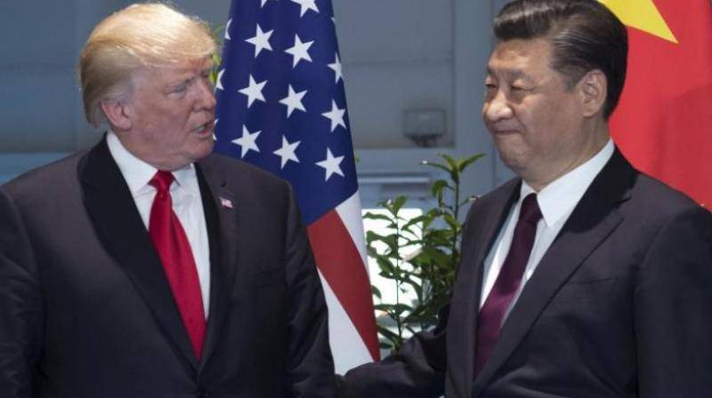 Asian markets rise as China and US agree to avert trade war