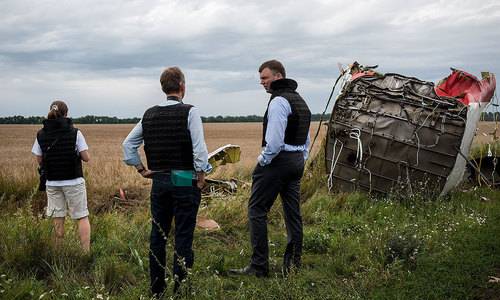 Dutch, Australia say Russia responsible for downing MH17 with 298 people on board
