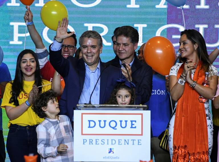Anti-FARC conservative wins in Colombia, faces leftist in runoff