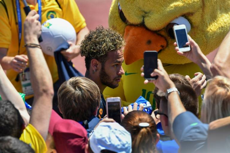 Neymar is star attraction as fans swarm to Brazil training